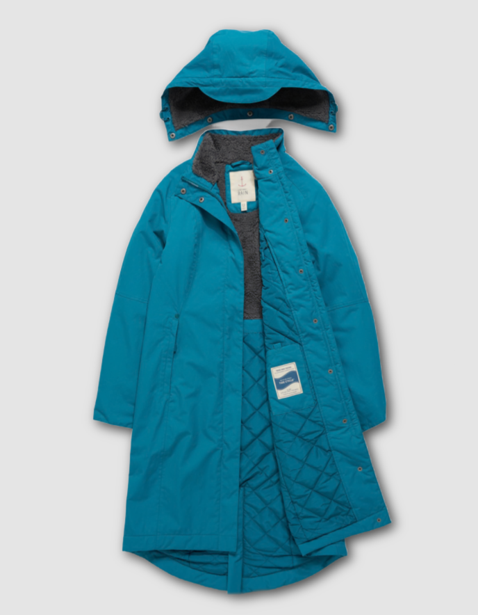 Blue raincoat with a hood on a light gray background