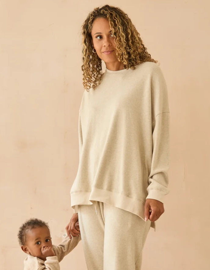 beige oversized sweatshirt and cotton cream trousers