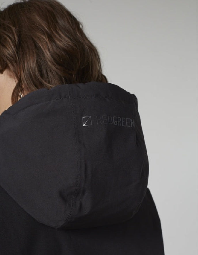 Black jacket with a brand logo on the shoulder against a neutral background