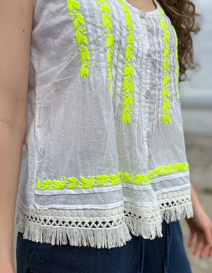white cotton embroidered top with yellow detail