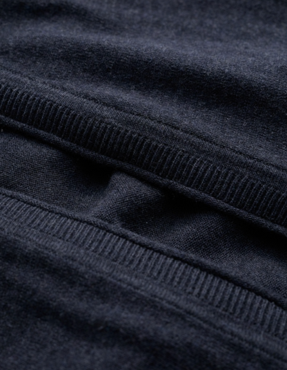 Close-up of dark blue fabric with a ribbed texture