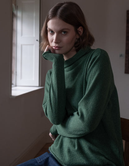 fine merino green jumper with turtle neck and long sleeves