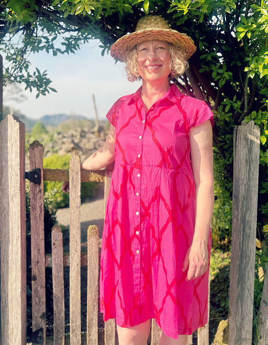 everyday shirt style knee length summer dress with capped sleeves in hot pink cotton with red details