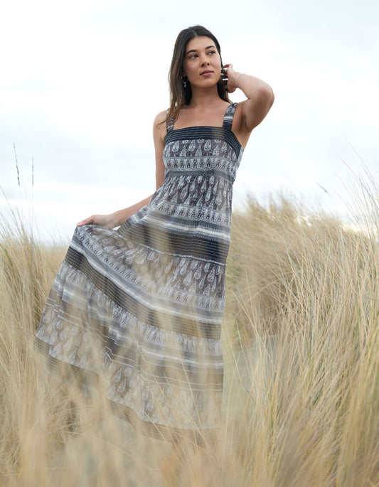 maxi length cotton sun dress with shoulder straps in black and stone stripe and paisley print