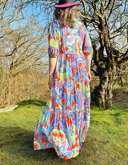 abstract baroque print maxi dress with tiered flared shape and bracelet sleeves