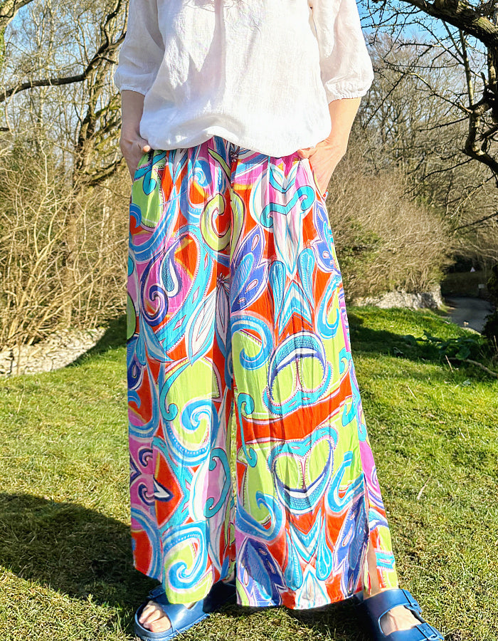 wide leg summer palazzo pant with elasticated waist and pockets in bright baroque style print
