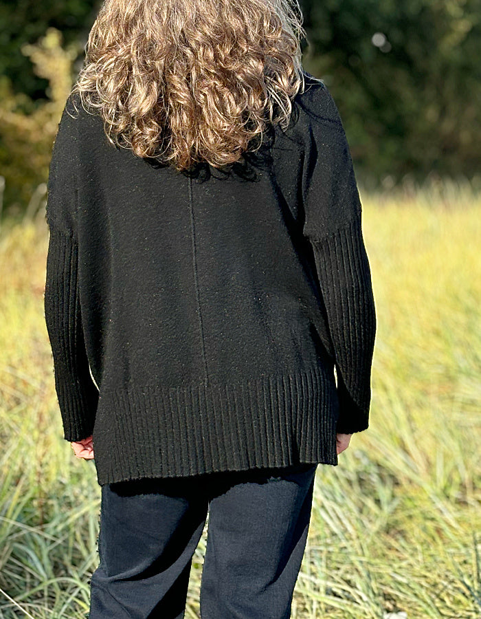 wool free, swing shape black cowl neck sweater