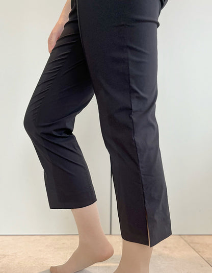 stretch black trapeze fabric trousers with 7/8ths length and size split hem