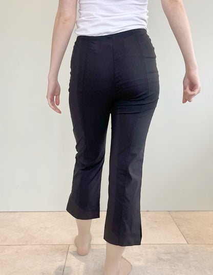 stretch black trapeze fabric trousers with 7/8ths length and size split hem