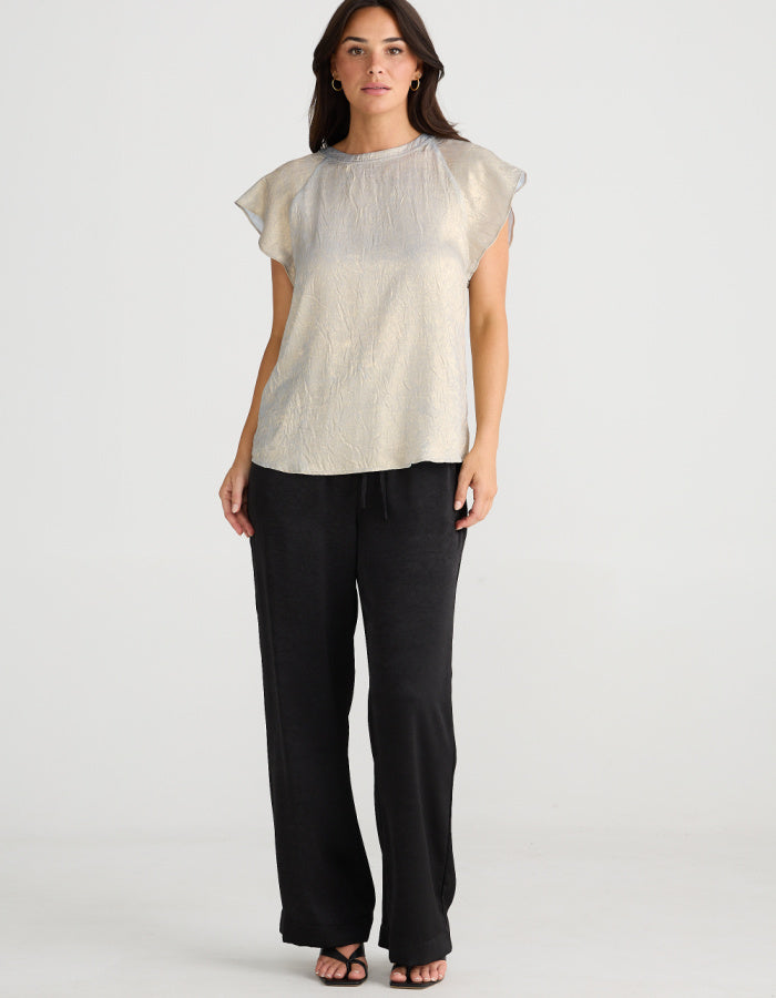 champagne coloured top with crew neck and fluted sleeves