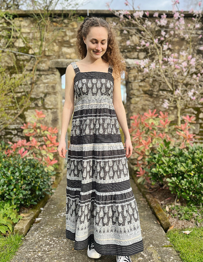 maxi length cotton sun dress with shoulder straps in black and stone stripe and paisley print