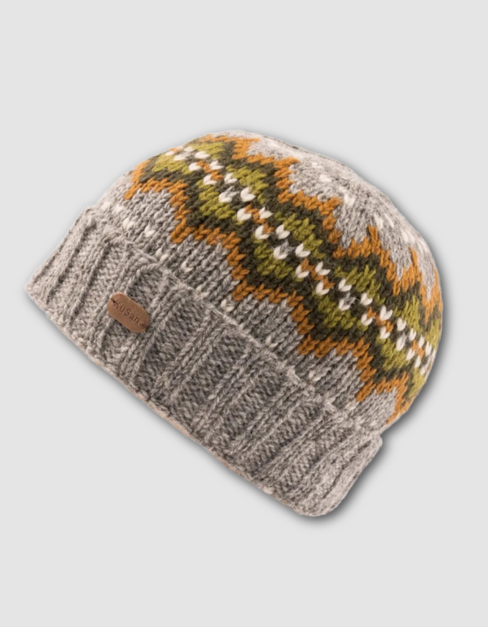 Knitted beanie with a patterned top on a light gray background