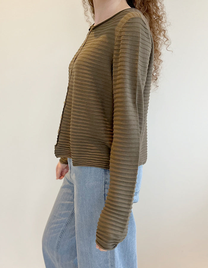 short wide boxy cardigan with ribbed texture, long sleeves and scoop neck in olive brown