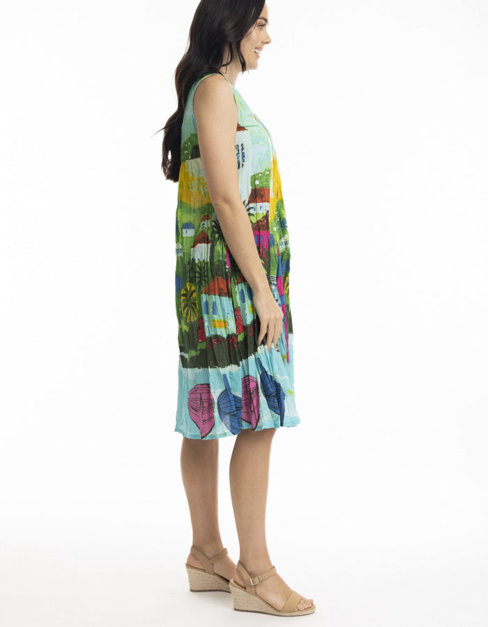 crinkle cotton sundress, sleeveless, knee length with pleated bodice. print inspired by the Caribbean coastline