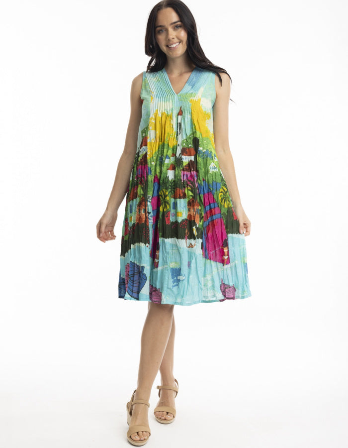 crinkle cotton sundress, sleeveless, knee length with pleated bodice. print inspired by the Caribbean coastline