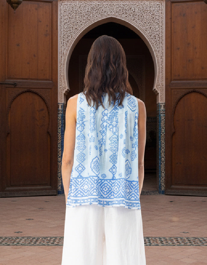 blue and white cotton sleeveless swing top