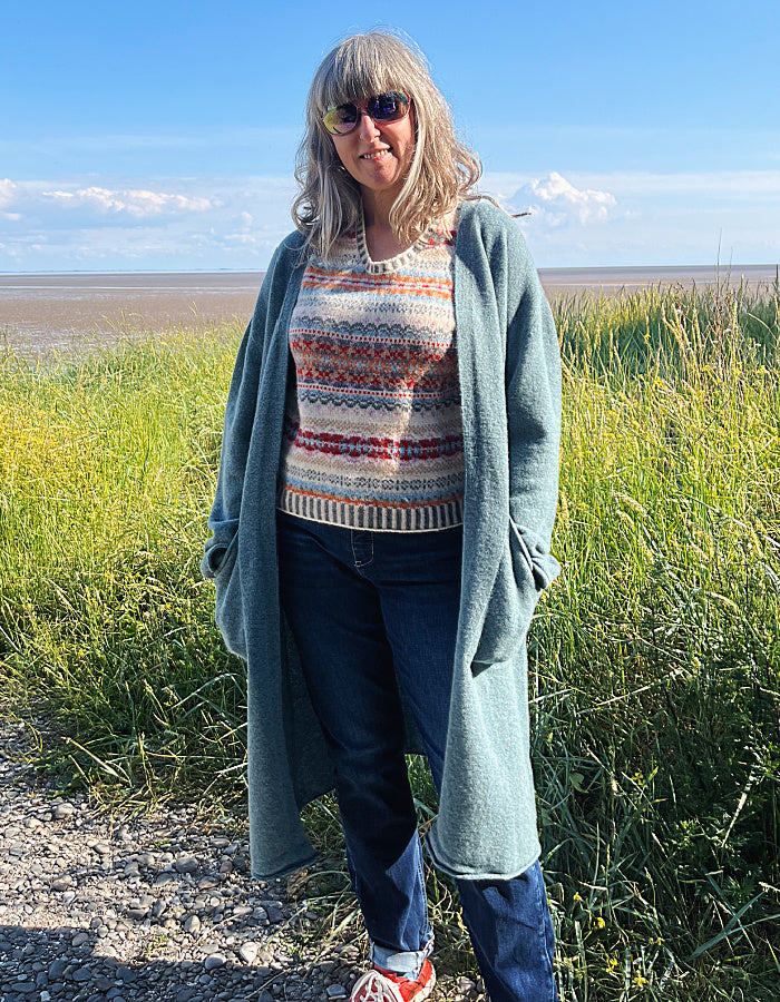 long teal green wool cardigan with deep patch pockets