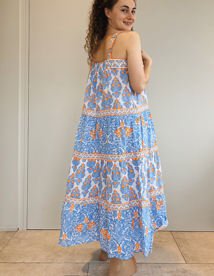 strappy tiered midi length sundress in sky blue and neon orange cotton lawn