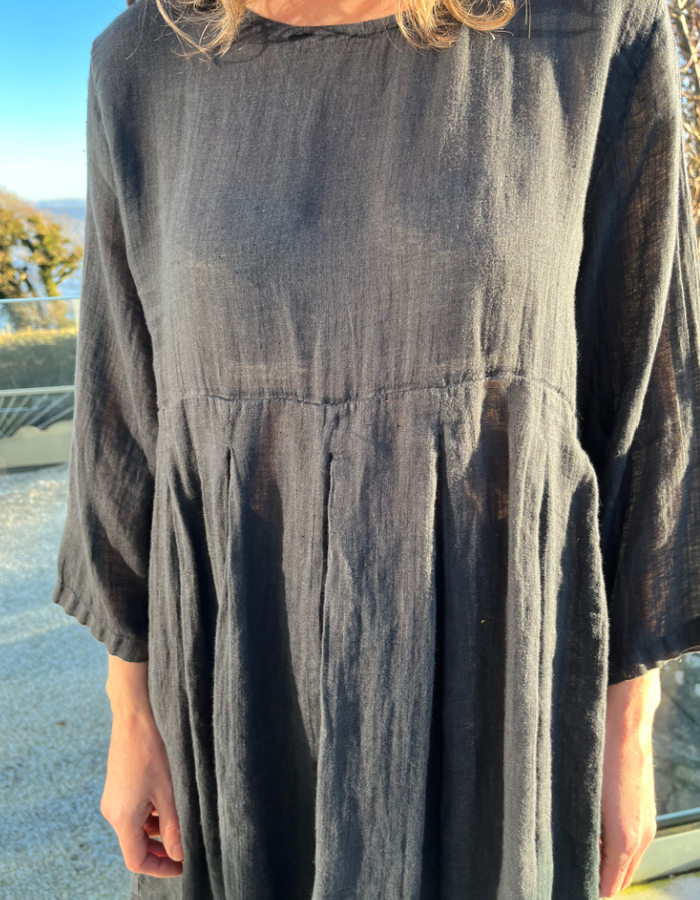 charcoal grey loose fit linen dress with three quarter sleeves and pockets