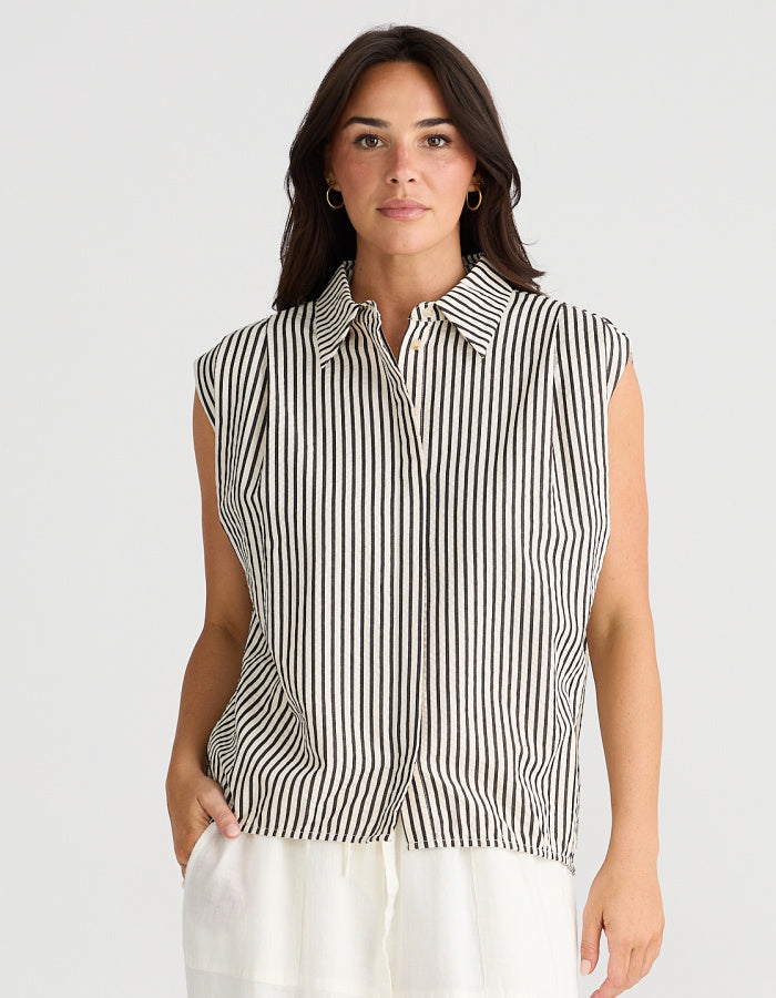 black and white striped sleeveless shirt in cotton seersucker fabric with an oversized fit