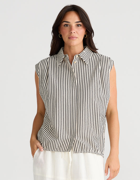 black and white striped sleeveless shirt in cotton seersucker fabric with an oversized fit