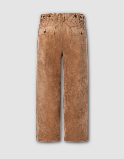 A pair of wide-leg cropped pants in a warm tan suede or velvety fabric, shown from the back against a light gray background.