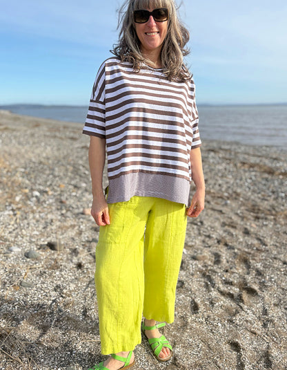 chocolate and white striped jersey tee with yellow linen trousers