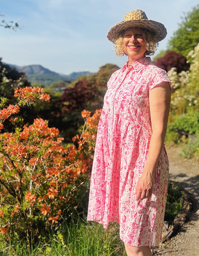 everyday summer cotton shirt style dress with a knee length and capped sleeves in a very pretty pink paisley print