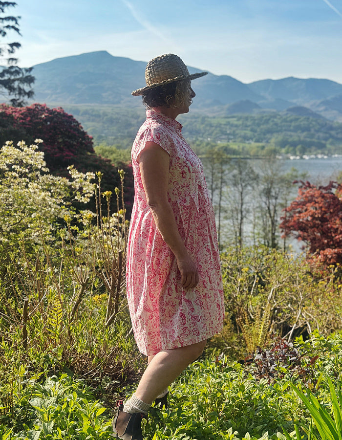 everyday summer cotton shirt style dress with a knee length and capped sleeves in a very pretty pink paisley print
