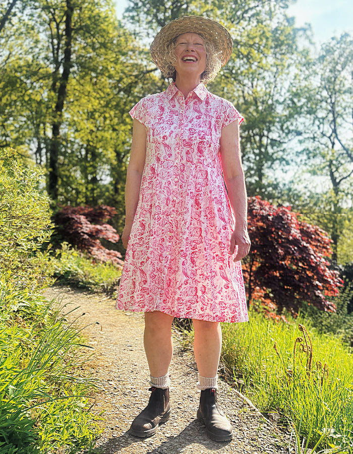 everyday summer cotton shirt style dress with a knee length and capped sleeves in a very pretty pink paisley print