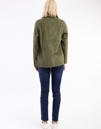 woman wearing olive green cord shirt stye jacket