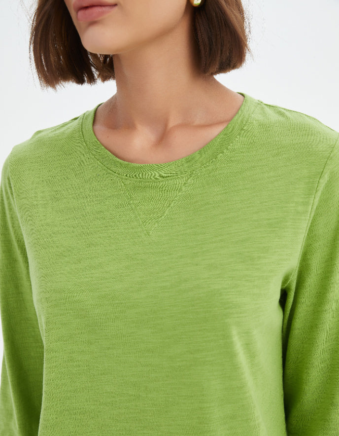 woman wearing cotton slub 3/4 sleeve lime green t shirt
