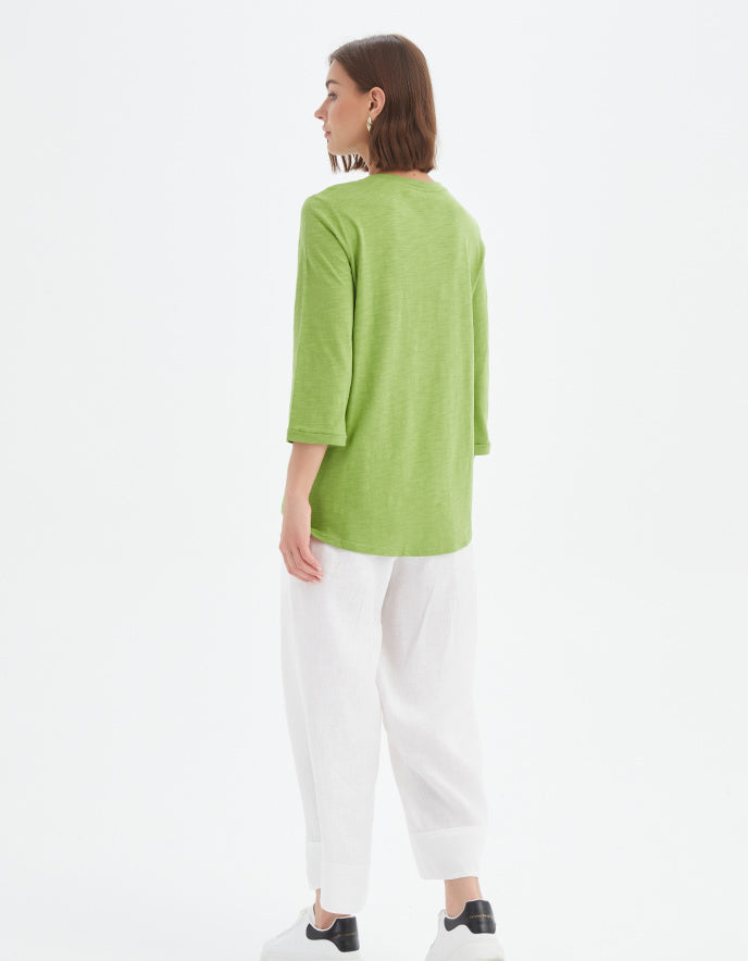 woman wearing cotton slub 3/4 sleeve lime green t shirt