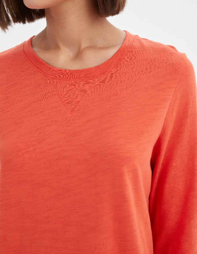 woman wearing orange cotton slub 3/4 sleeve t shirt