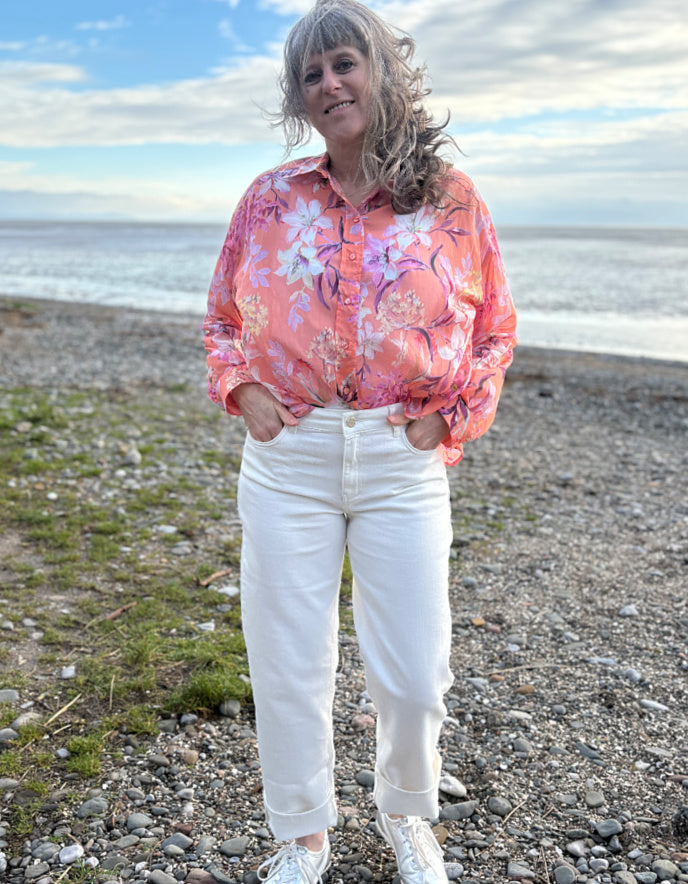 summer cropped cream jeans worn with a floral peach print cotton blouse