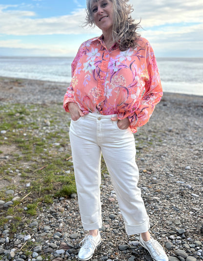 summer cropped cream jeans worn with a floral peach print cotton blouse