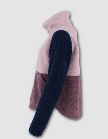A colorblock sherpa fleece jacket shown from the side profile against a light gray background. The jacket features a light pink upper body, a dark navy blue sleeve, and a dusty mauve lower body.