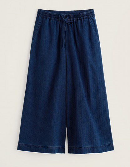 woman wearing wide leg denim culottes