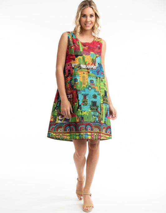 fully reversible A-line shift dress with one side colourful El Paso print  and on reverse lime green print with cactus and sombrero print, pockets on both sides