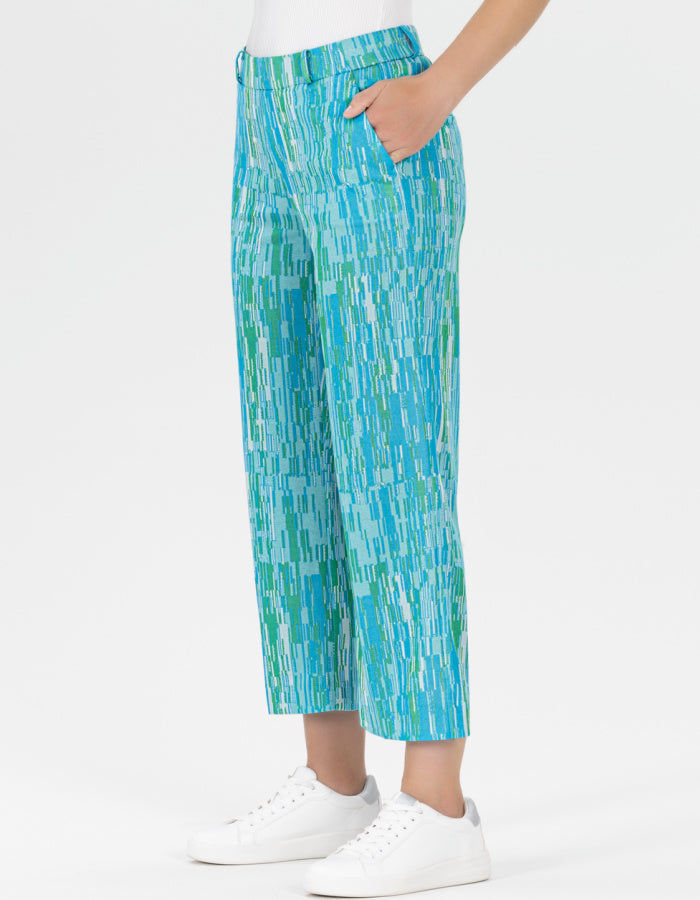 wide leg pull on culotte trouser with elasticated was it and side pockets featuring a unique abstract print in blues and turquoise and green