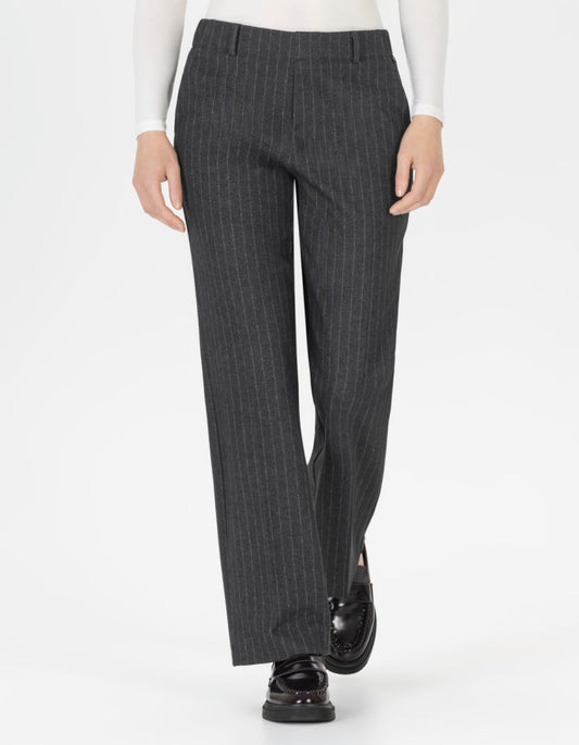 Grey pinstripe pants worn by a person on a white background