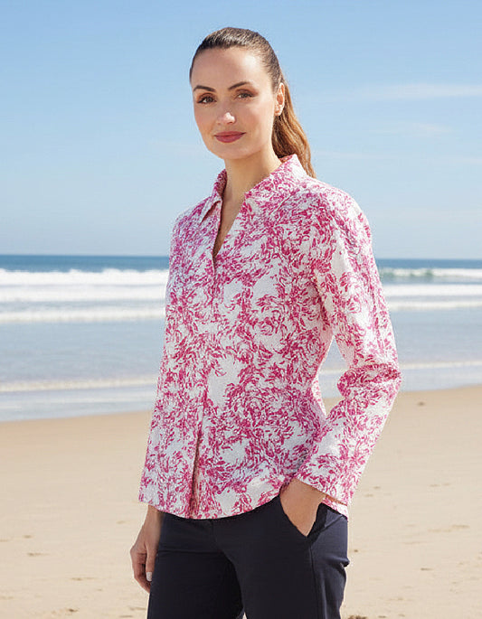 woman wearing cotton shirt with pink fish print