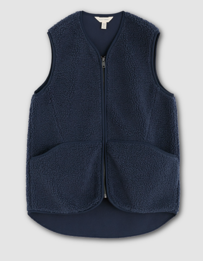 Navy blue fleece vest on a light gray background
