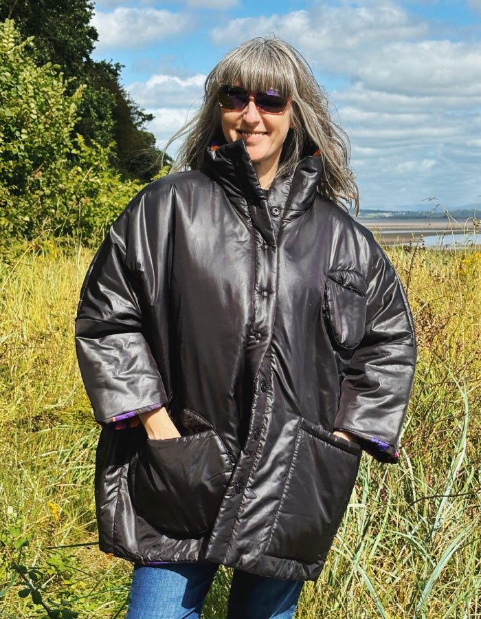 reversible oversized lightweight coat in black and purple and orange print