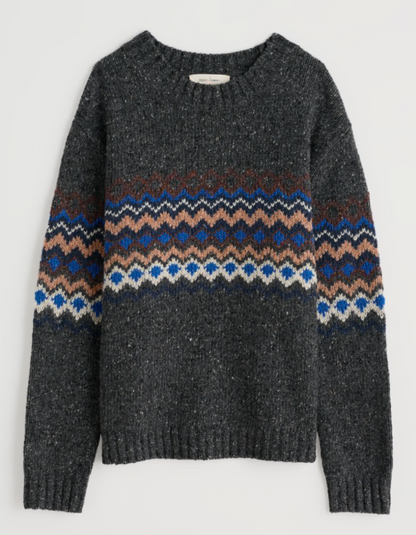 Gray sweater with a colorful pattern on a light gray background