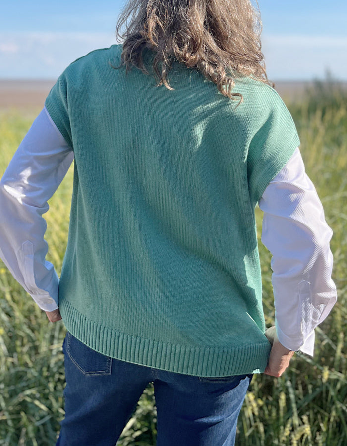 green cotton viscose tank top with ribbed edges. wear over shirt or t shirt