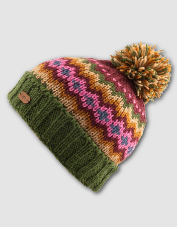 Knitted hat with a colorful pattern and green brim on a light gray background