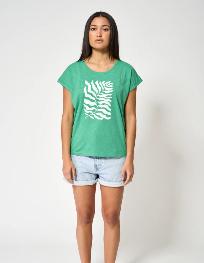 green cotton short sleeve t shirt with white leaf motif print