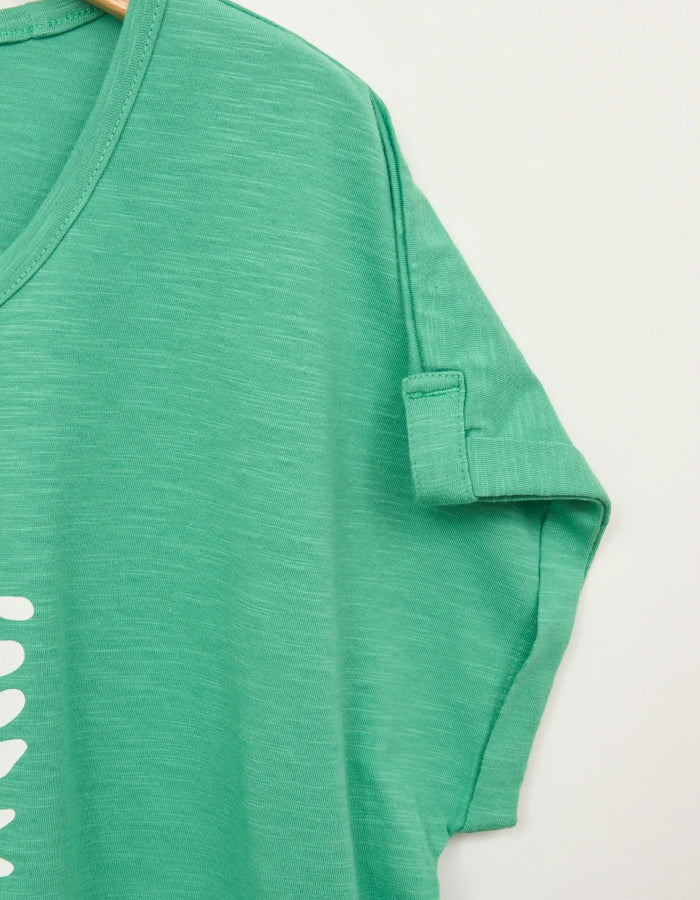 green cotton short sleeve t shirt with white leaf motif print