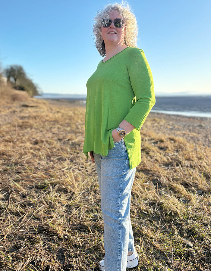 lightweight green viscose blend sweater with A-line shape